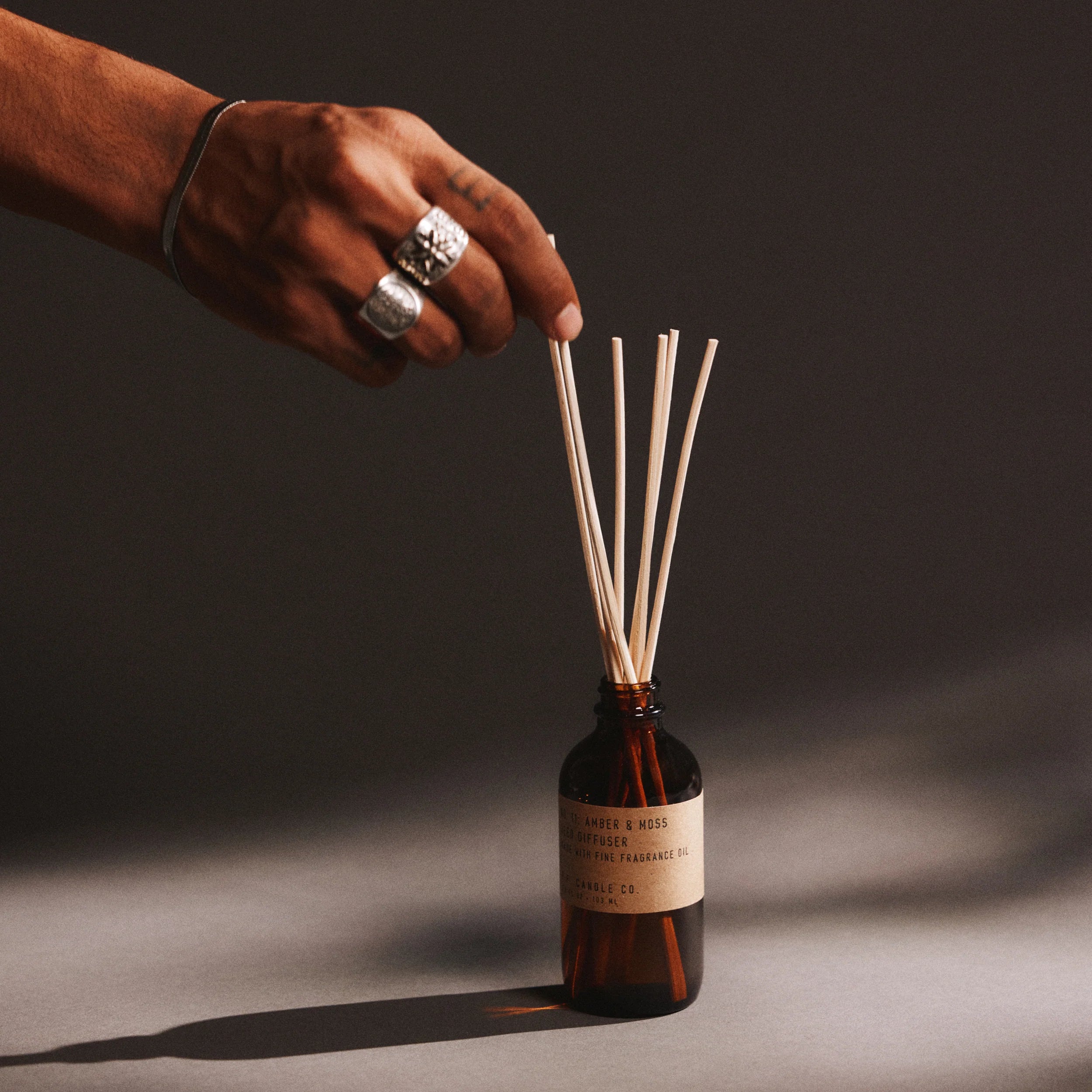 amber_moss_reed_diffuser_styled_ecomm_png.webp